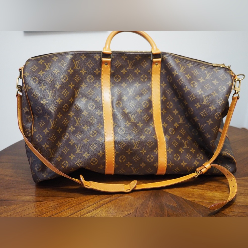 Never used lv keepal bag 50